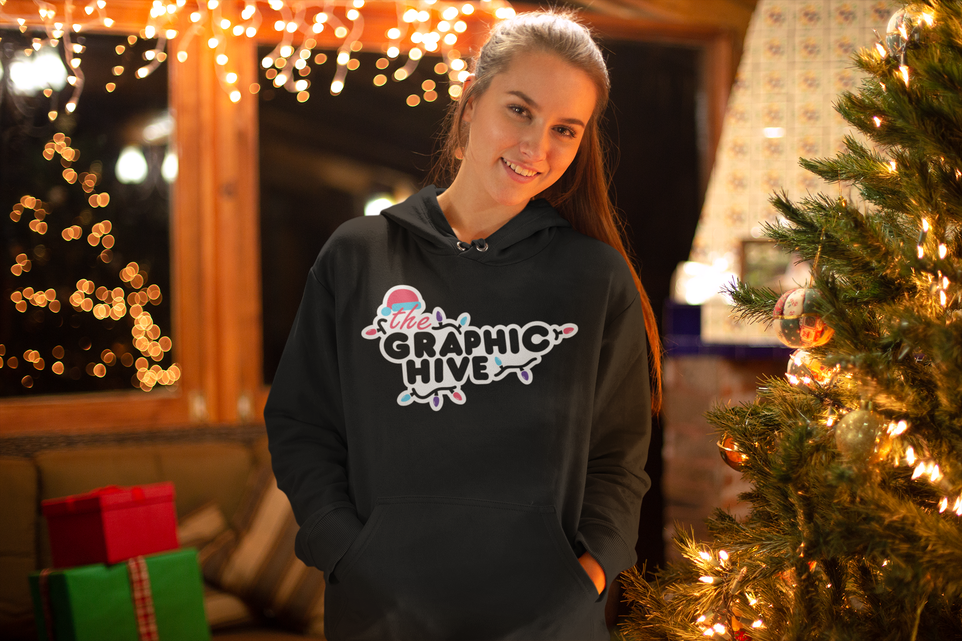 pullover-hoodie-mockup-of-a-woman-in-front-of-a-christmas-tree-23518
